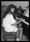 Playing piano at friend Scott's home.